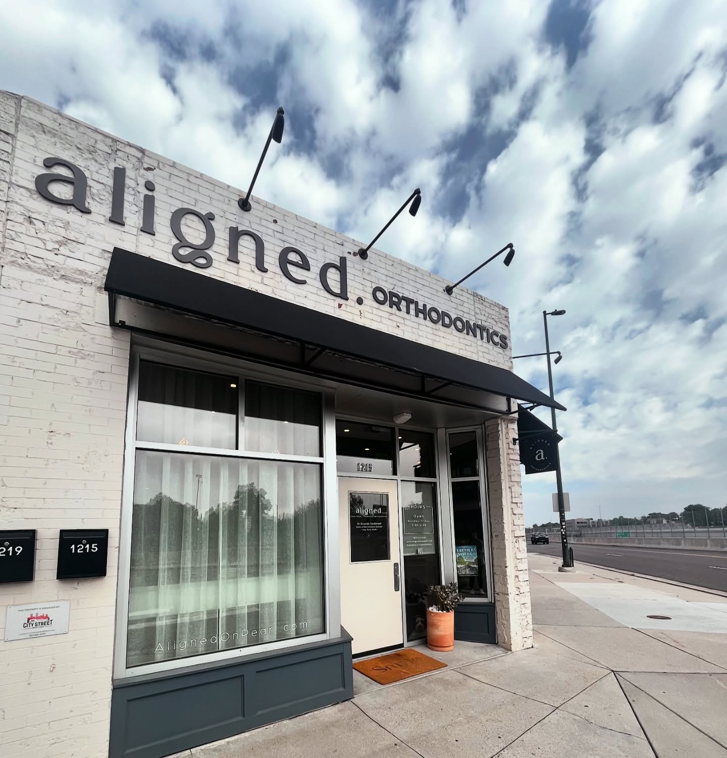 Aligned Orthodontics storefront at 1215 S Pearl St in Denver's Platt Park neighborhood